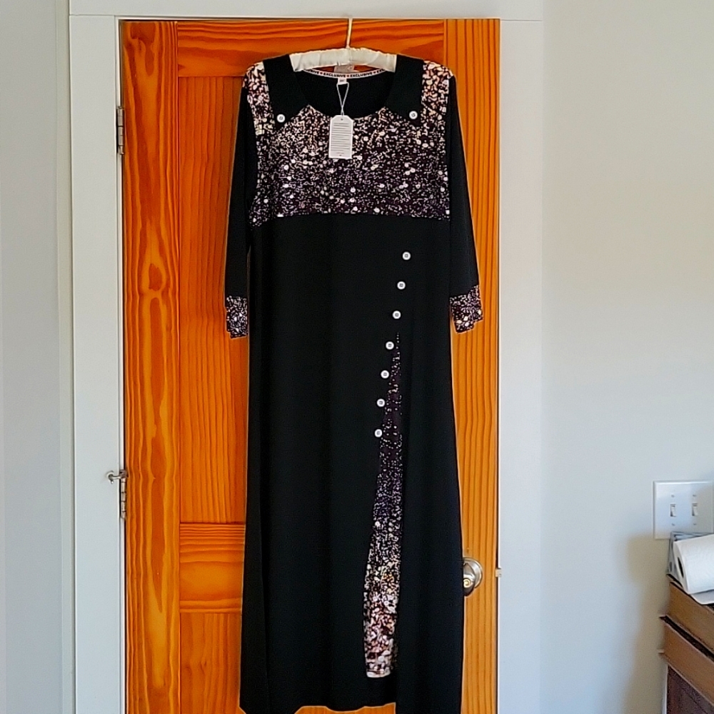 Exclusive tea length black  dress.
